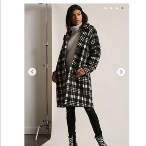A woven topcoat featuring allover plaid pattern